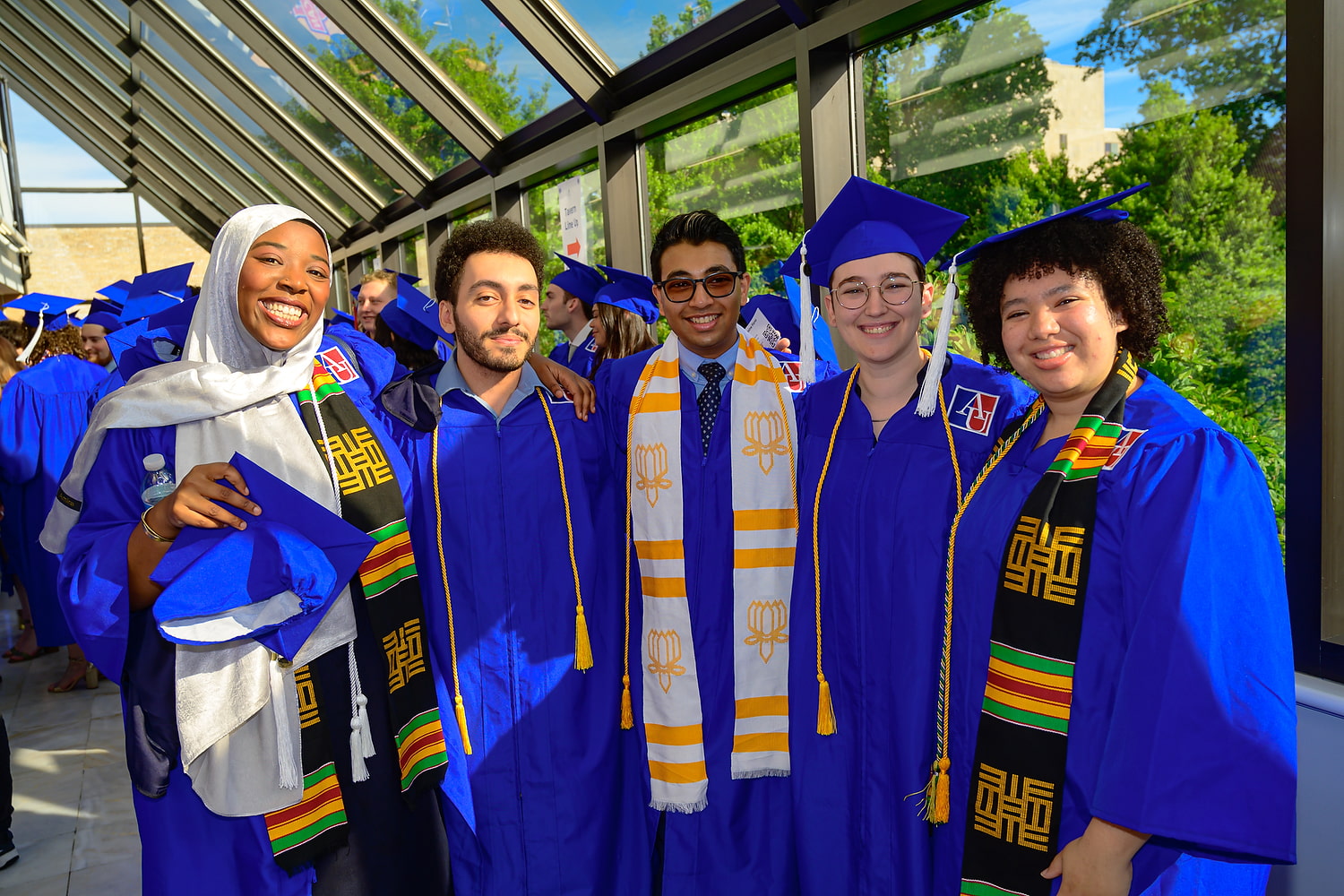 Students in regalia at graduation. Students in regalia at graduation.